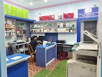 Lokenath Infotech service counter and Xerox machine